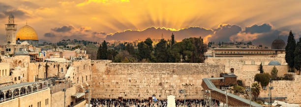 Panorama. Ruins of Western Wall of ancient Temple Mount is Panorama. Ruins of Western Wall of ancient Temple Mount is  a major Jewish sacred place and one of the most famous public domain places in the world, Jerusalem. Image digitally manipulated to express vintage and mystic style wailing wall stock pictures, royalty-free photos & images