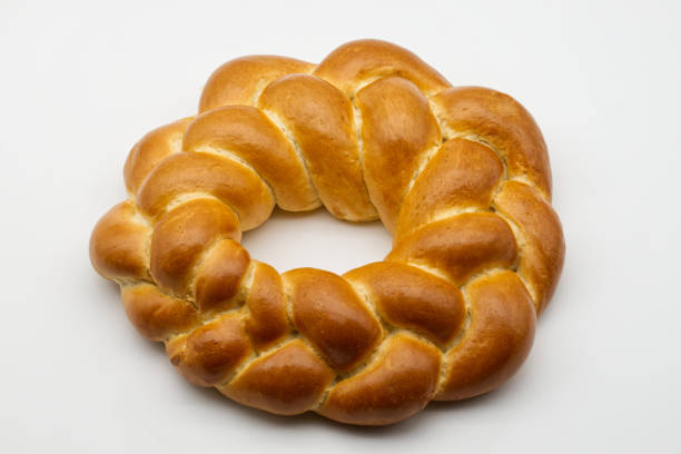 Traditional Italian bread Corona di Pasqua (Easter wreath) isolated on white background.