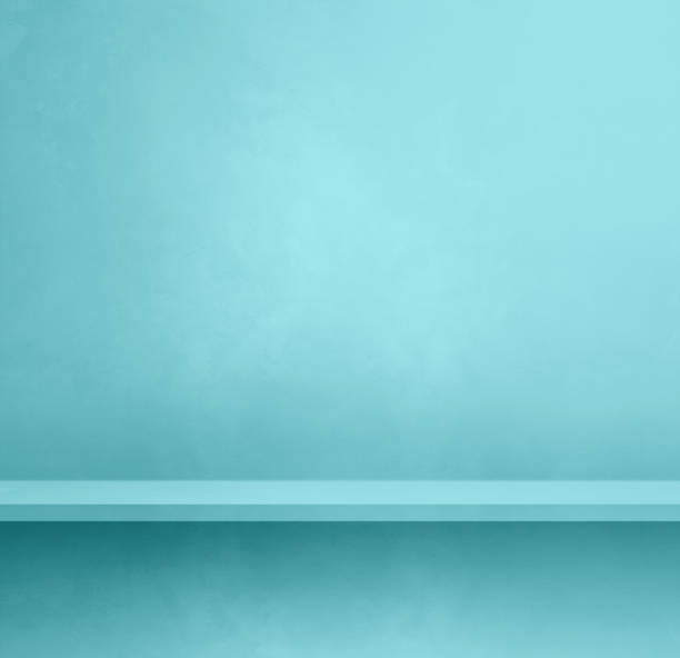 istock Empty shelf on an aqua blue concrete wall. Background template. Square mockup 1474074184