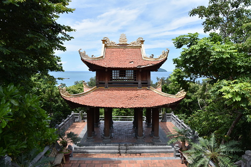 Buddhist pagoda in the forest on tropical Vietnamese island