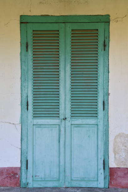 Light Blue French Doors with Shutters at Phu Tuong Prison stock photo