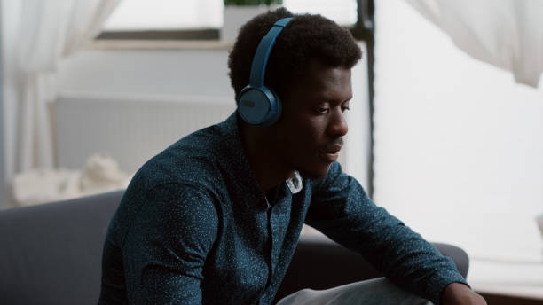 istock Close up black man hands browsing using laptop computer, searching social media 1474084449
