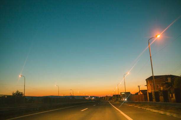 beautiful sun rising sky with asphalt highways road in rural scene use land transport and traveling background,backdrop