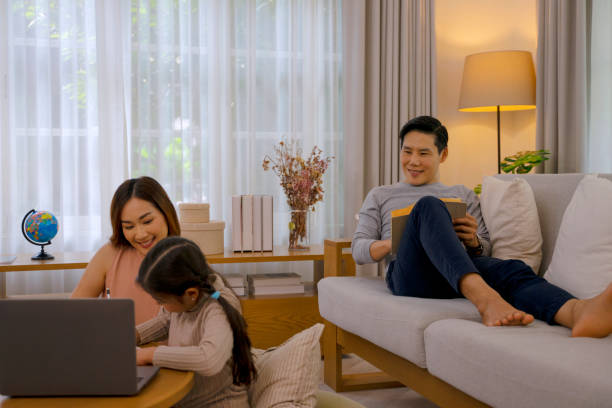 istock Family with one daughter at home. 1474088491