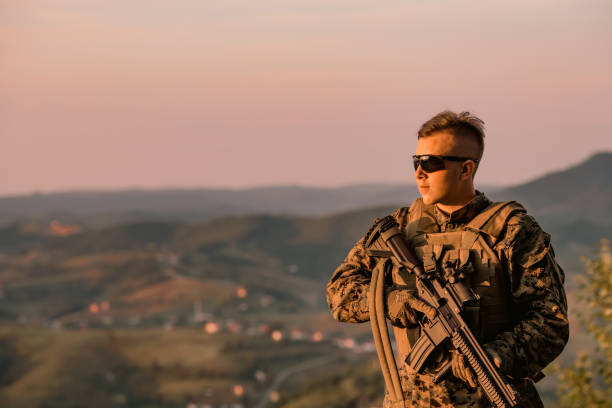 istock Soldier portrait on sunset local hero urban legend authentic 1474089036