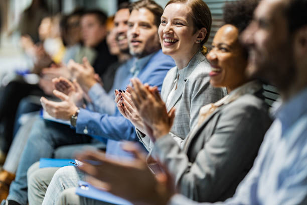 istock Applauding on education event in board room! 1474094245