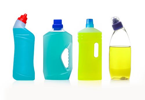 Different bottles with cleaning products, isolated on an white background