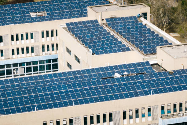 istock Aerial view of solar panels on building rooftop 1474097604