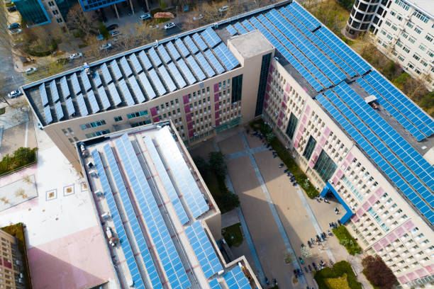 istock Solar power panels on top of building 1474097669