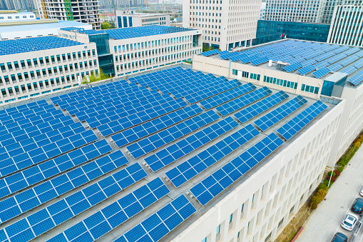 Solar panels on roof of modern factory