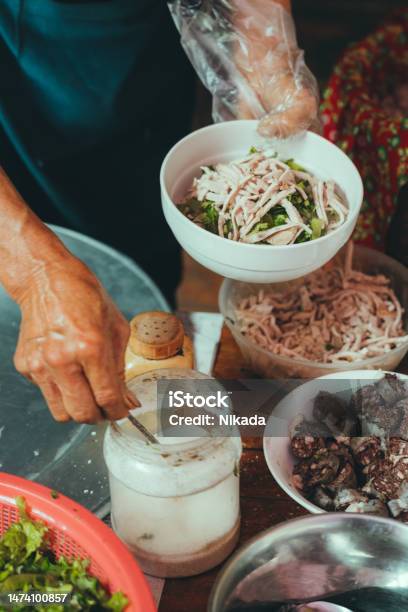 Senior Woman Preparing Pho Soup At Market In Bac Ha Vietnam Stock Photo - Download Image Now