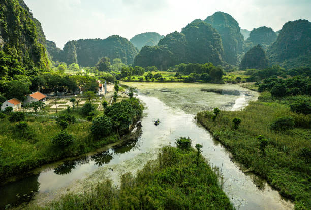 istock Drone view over Tam Coc with karst formations, Ninh Binh province, Vietnam 1474101074