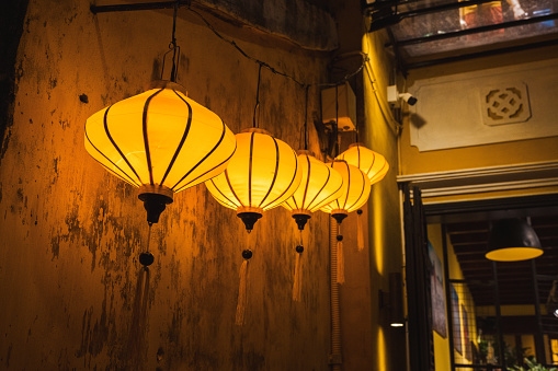 vibrant shining yellow lanterns at night in old town Hoi An , Vietnam