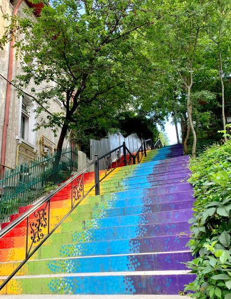 istock Rainbow colored stairs in the city, left view 1474104542