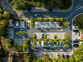 Aerial view of the parking lot in the urban green belt