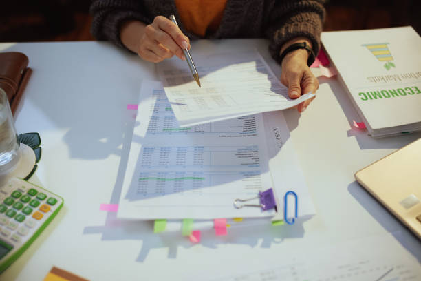 istock tax time. accountant woman working with documents 1474113186