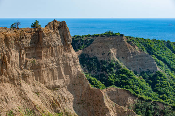 istock Steep cliff in Ariburnu cliffs - The place called Sphinx from the sea side 1474117316