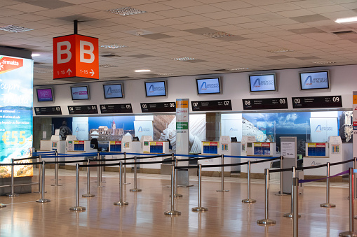 Palermo, Italy - January 09, 2023 - The check-in and baggage boarding area of Falcone e Borsellino airport in Palermo