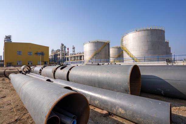 istock Pipelines and storage tanks on chemical plant site 1474120367