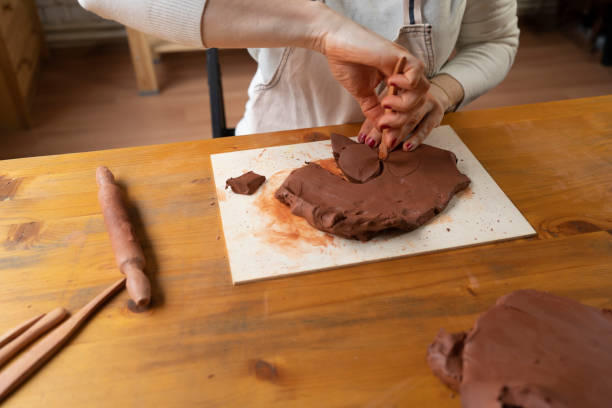 istock Ceramist artist female work in studio 1474122834