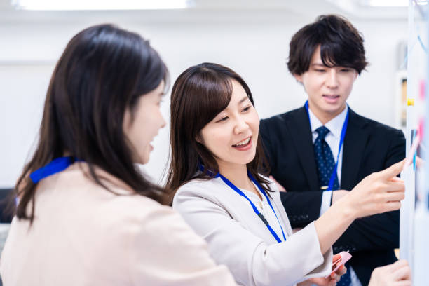 istock Staff enjoying working in the office 1474123310