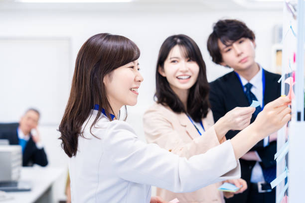 istock Staff enjoying working in the office 1474123449