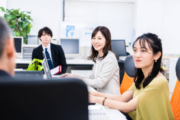 istock Staff enjoying working in the office 1474123833