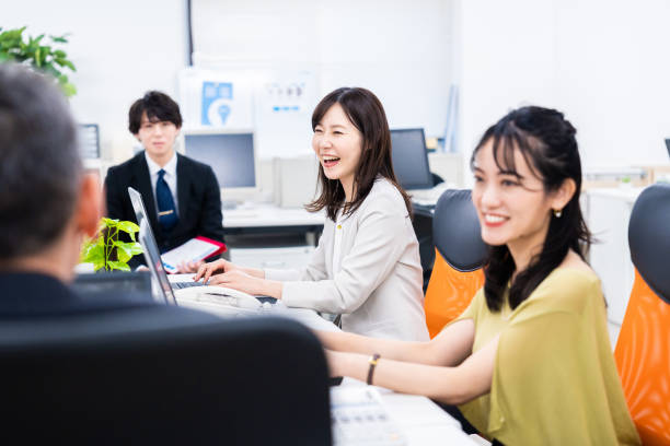 istock Staff enjoying working in the office 1474123847