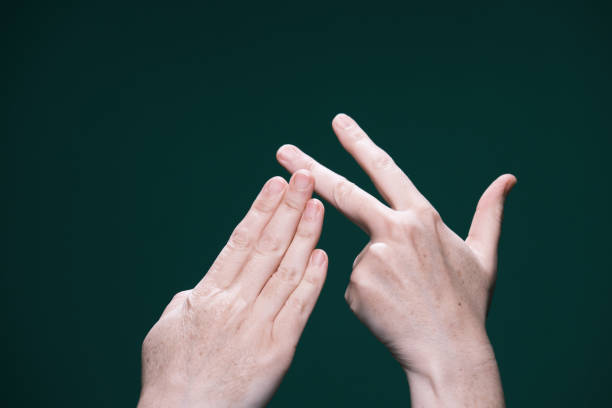 istock Human hands are playing paper rock scissors 1474124307