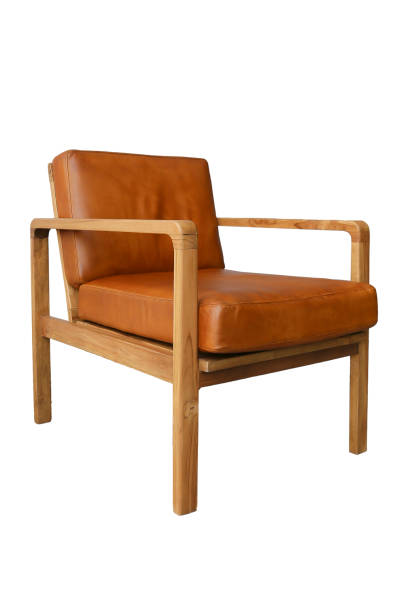 istock Orange leather chair isolated on white background. 1474124456