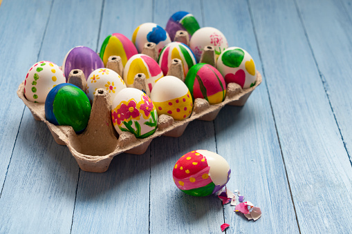 Easter Eggs on Blue Wooden Background
