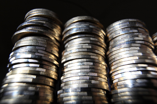 Coin piles heap of money