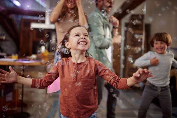 istock Joyful little girl having fun while dancing at home. 1474130431