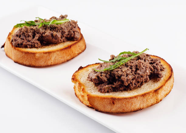 istock delicious italian bruschetta with truffle pate on white plate 1474130585