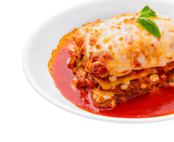 istock italian lasagna with tomato sauce isolated on white background 1474130645