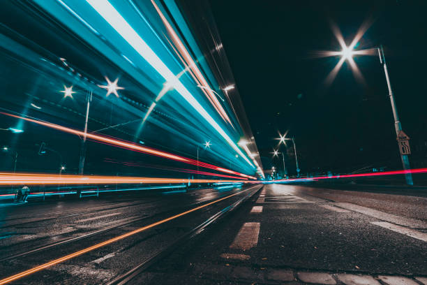 istock city street at night with vehicles light trails 1474130842