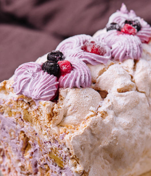 istock Meringue roll cake with cream and berries 1474131978