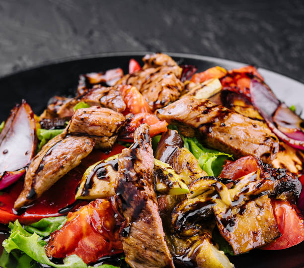 istock Vegetable and beef salad in a plate 1474132270