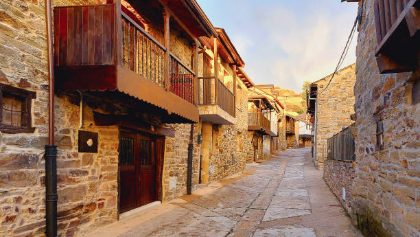 istock Medieval village street at dusk 1474132323
