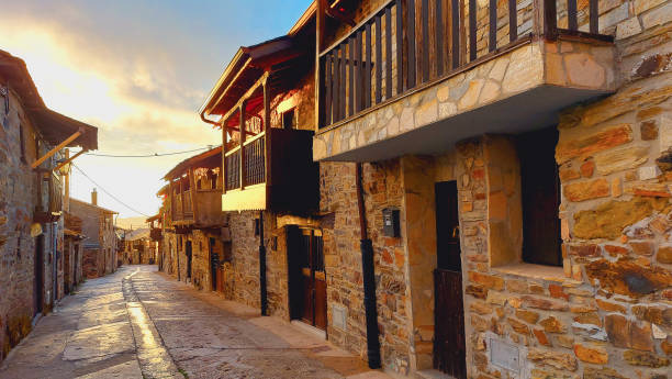 istock Medieval village street at dusk 1474132354