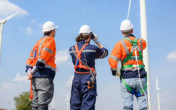 istock Maintenance engineer technician team working outdoor at wind turbine field 1474133137
