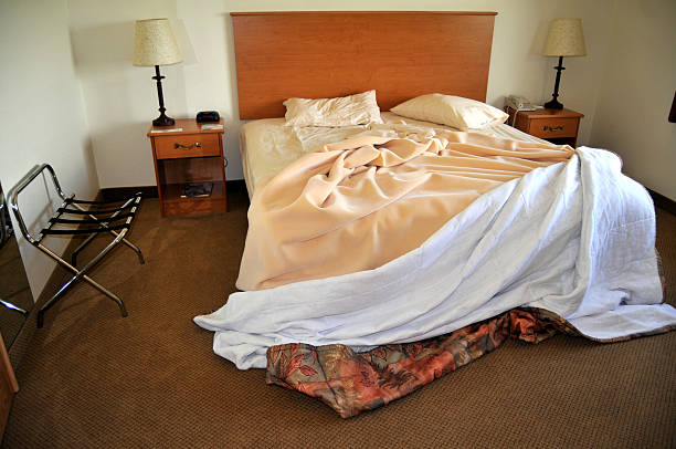 Hotel room in the morning Uncleaned hotel room in a typical American hotel unhygienic stock pictures, royalty-free photos & images