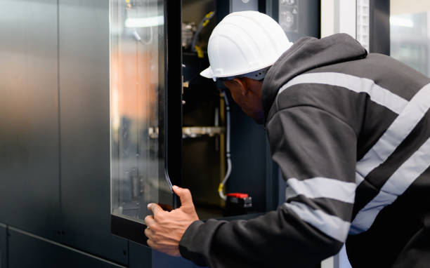 istock Technician engineer team checking and repairing part of automatic machine 1474135863