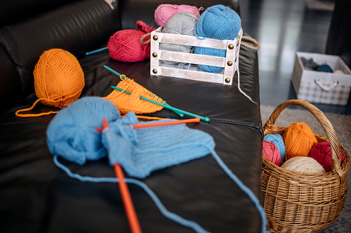 Knitting material at sofa in living room