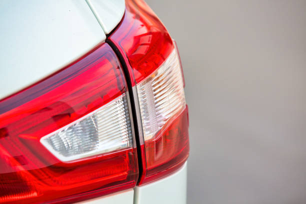 istock Tail Lights: Right side Car Lights during Daytime Traffic 1474141019