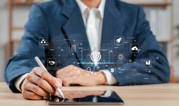 istock Businessman analyzing customer data and marketing strategy. Concepts of setting goals and developing business guidelines for success. 1474145325