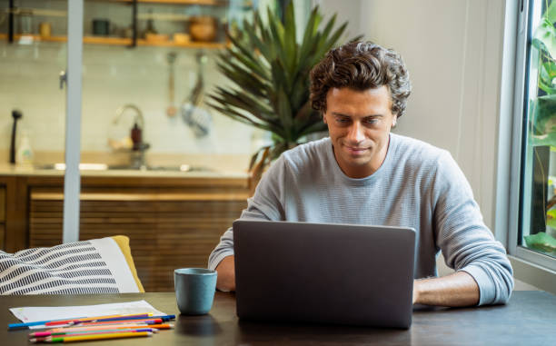 istock Hispanic Latin man working from home. 1474147934