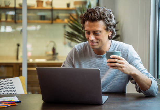 istock Hispanic Latin man working from home. 1474147935