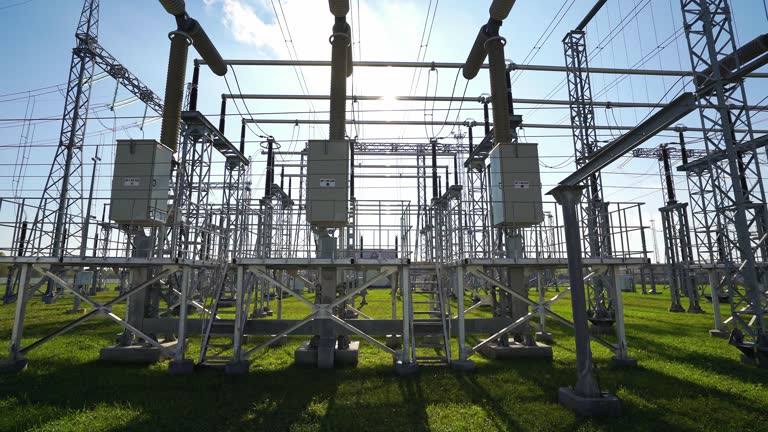 Power line industrial view, line of electric transmissions, view of the steel towers with wires, the process of energy conversion and transportation electricity.