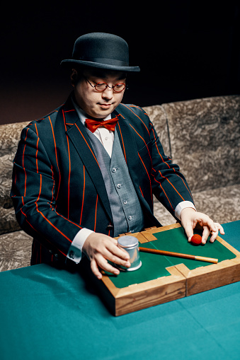 Portrait of a mid adult male magician in Japan
